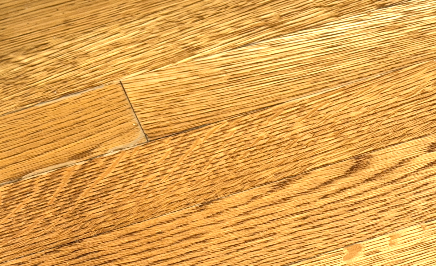 Hardwood flooring damage from an ice dam